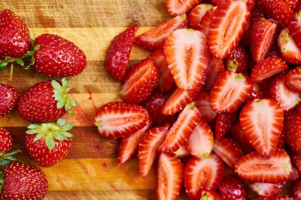 Sliced and whole strawberries